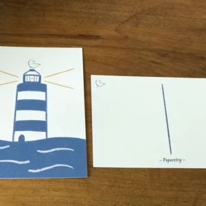 Carte postale illustrée d'un phare et d'une mouette