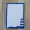 Petit bloc-notes bleu illustré d'un phare